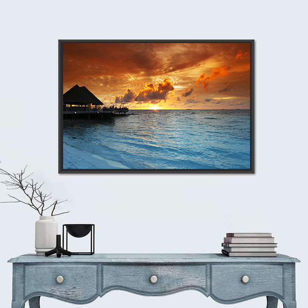 Maldives Thatched Hut on Pier at Sunset Canvas Wall Art