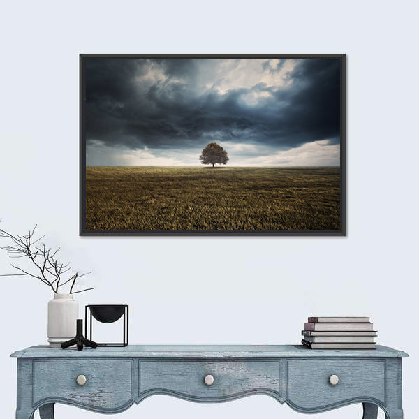 Tree In Field Under Storm Clouds Canvas Wall Art