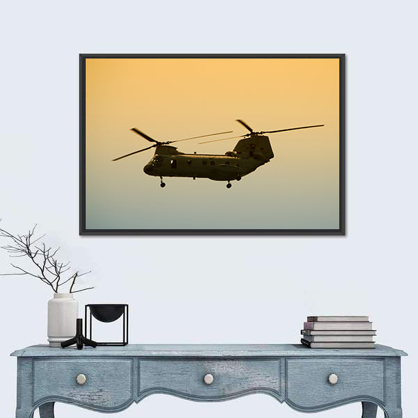 Military Cargo Helicopter In Flight At Dawn Canvas Wall Art