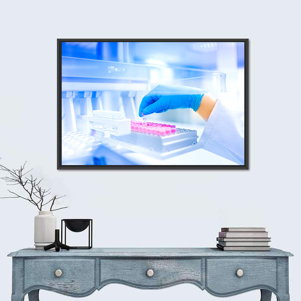 Hand Holding Vial in Medical Laboratory Canvas Wall Art