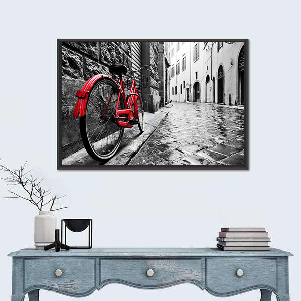 Red Bicycle on Cobblestone Street Canvas Wall Art