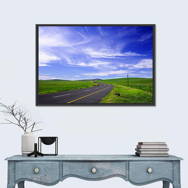 Winding Road Through Green Fields Canvas Wall Art
