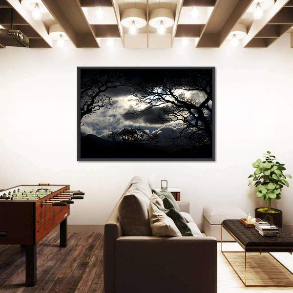 Silhouetted Trees Under Storm Clouds Canvas Wall Art