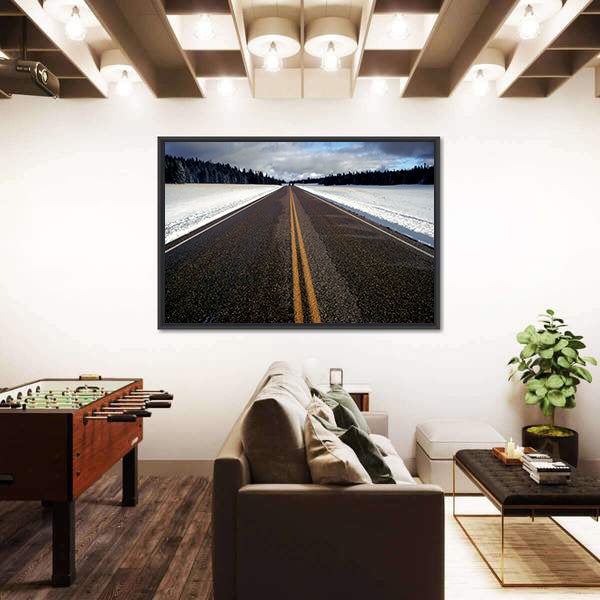 Straight Strip Of Road In Winter Canvas Wall Art