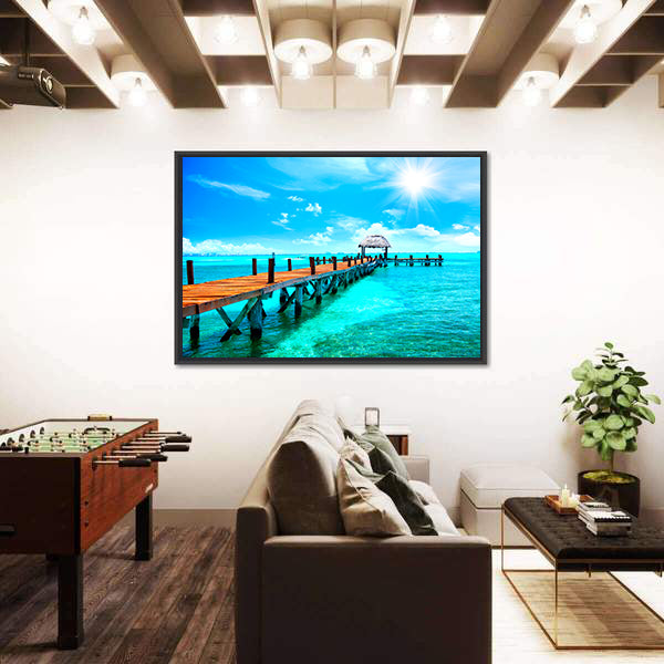 Sunlit Wooden Pier and Thatched Hut Canvas Wall Art