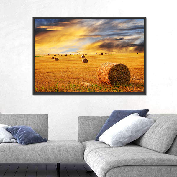 Golden Sunset Over Farm Field With Hay Bales Canvas Wall Art