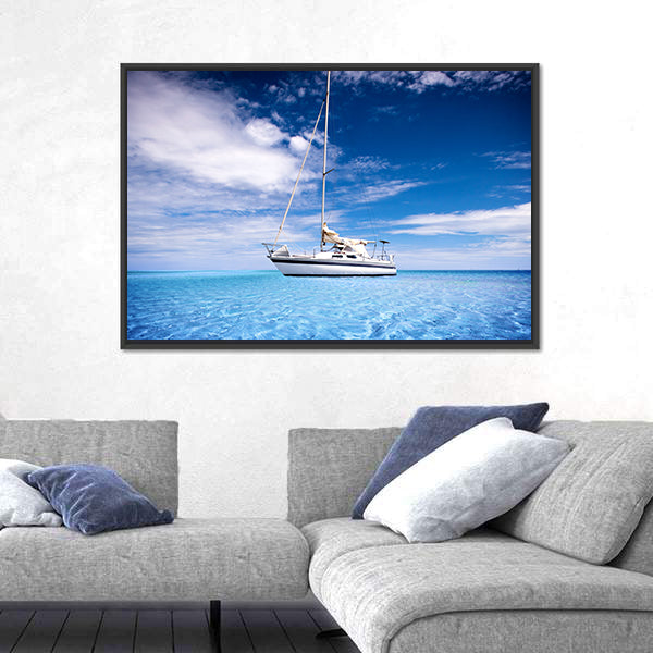Single-masted White Sailboat on Turquoise Water Canvas Wall Art