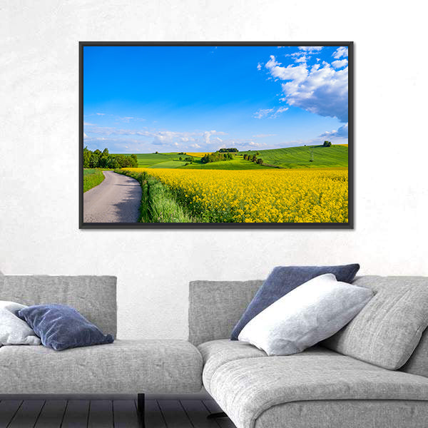 Oilseed field In Italian Countryside Canvas Wall Art
