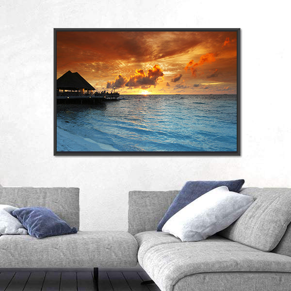 Maldives Thatched Hut on Pier at Sunset Canvas Wall Art