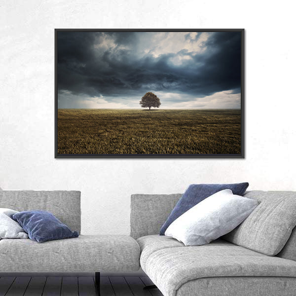 Tree In Field Under Storm Clouds Canvas Wall Art