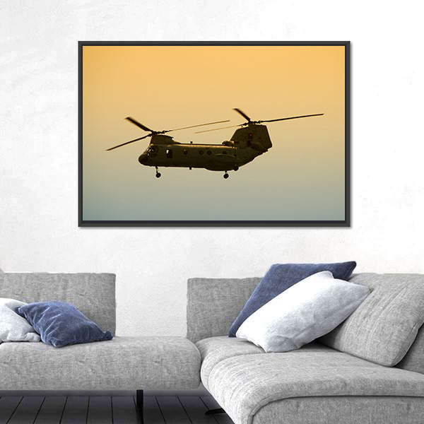 Military Cargo Helicopter In Flight At Dawn Canvas Wall Art