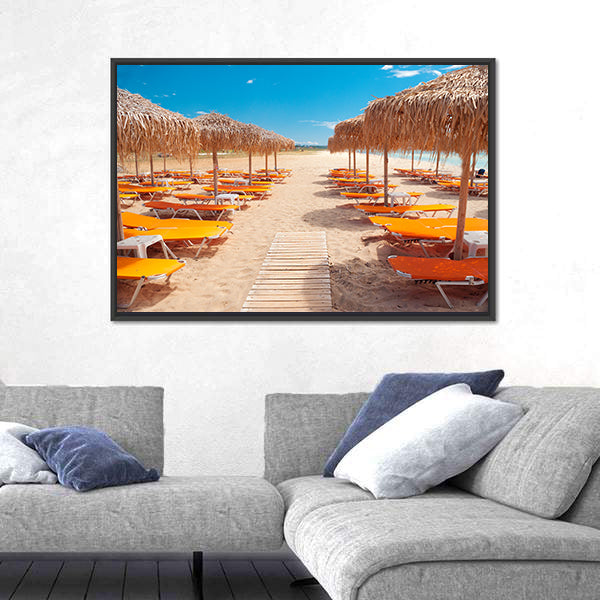 Greek Beach with Wooden Walkway and Orange Loungers Canvas Wall Art