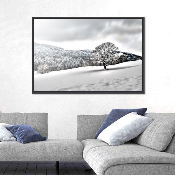 Lonely Tree In Snowy Landscape Canvas Wall Art