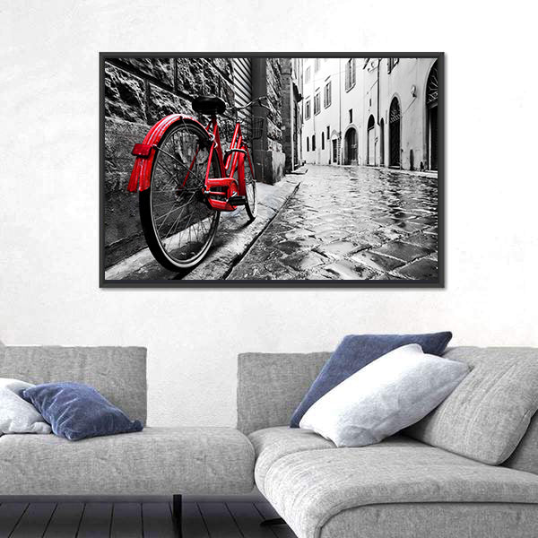 Red Bicycle on Cobblestone Street Canvas Wall Art