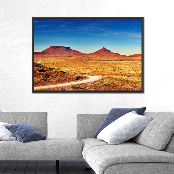 Winding Desert Road to Distant Peaks Canvas Wall Art