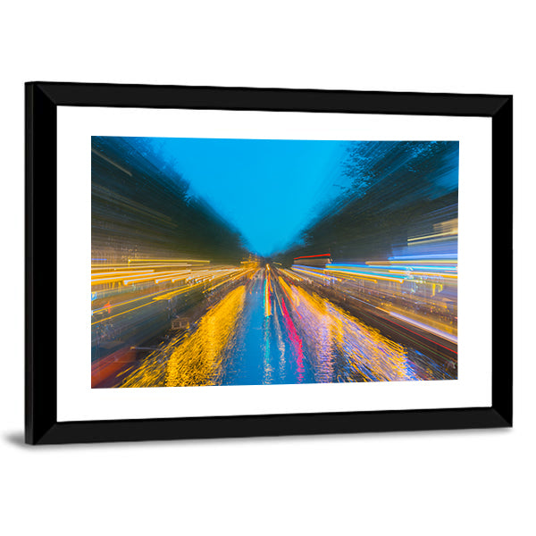 Urban Night Travels Canvas Wall Art in orange, yellow and blue, framed print, product view on a white background