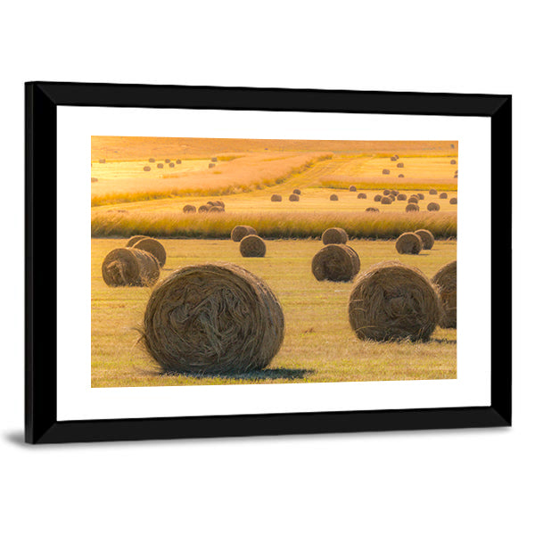 Hay Bales On Golden Field At Sunset Canvas Wall Art