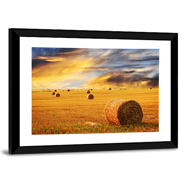 Golden Sunset Over Farm Field With Hay Bales Canvas Wall Art