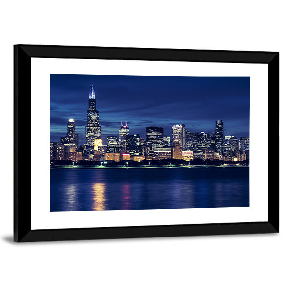 Chicago Skyline By Night Canvas Wall Art in black, blue and navy, framed print, product view on a white background