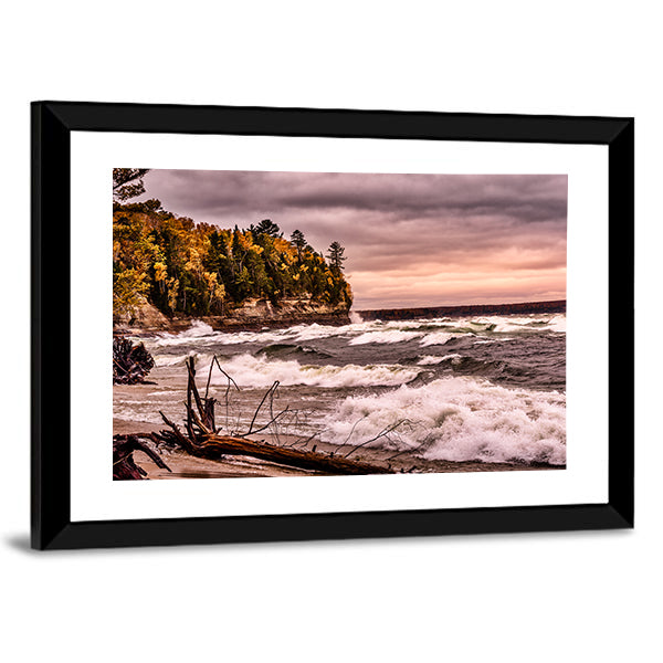 Driftwood on Autumn Lakeshore Canvas Wall Art in gray, brown and orange, framed print, product view on a white background