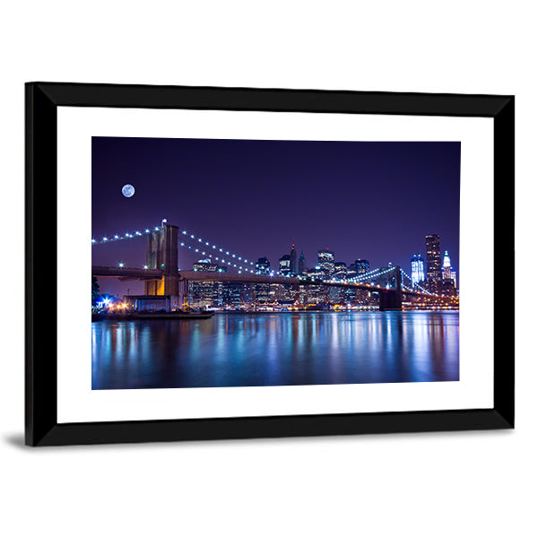 Brooklyn Bridge at Night Canvas Wall Art in black, blue and purple, framed print, product view on a white background