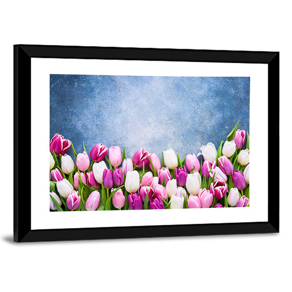 Border Of Pink And White Tulips Canvas Wall Art in white, blue and pink, framed print, product view on a white background