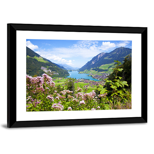 Summer Landscape In Lungern Village Canvas Wall Art in green and blue, framed print, product view on a white background