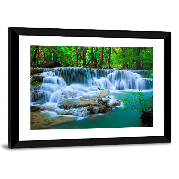 Huay Ma Khamin Waterfall In Kanchanaburi Thailand Canvas Wall Art in white, green and blue, framed print, product view on a white background