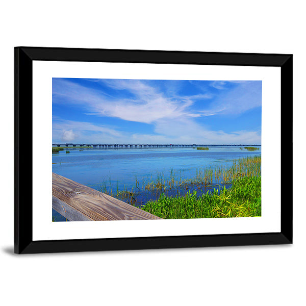 Meaher State Park Causeway Bridge Over Mobile Bay Canvas Wall Art in white, green and blue, framed print, product view on a white background