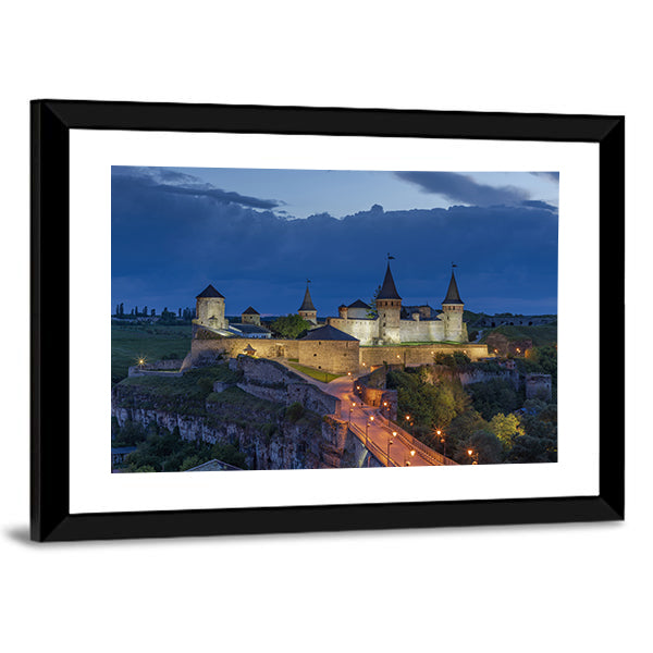 Kamianets Podilskyi Castle At Dusk In Ukraine Canvas Wall Art in gray, yellow and blue, framed print, product view on a white background