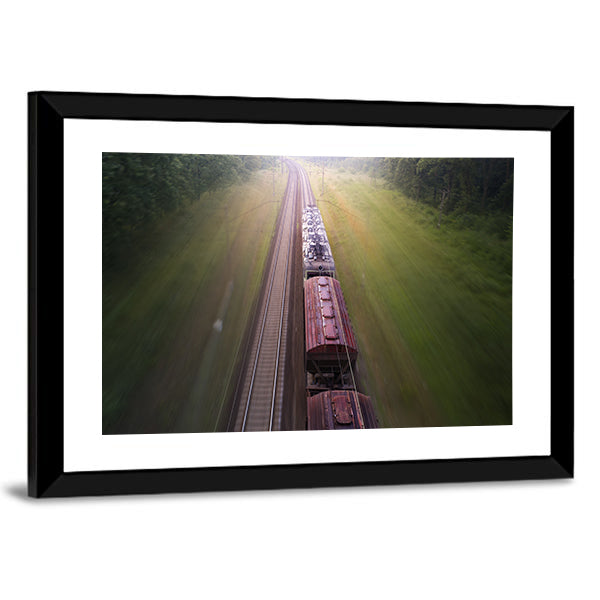 Freight Train Travels Through Foggy Forest Canvas Wall Art in gray, brown and green, framed print, product view on a white background