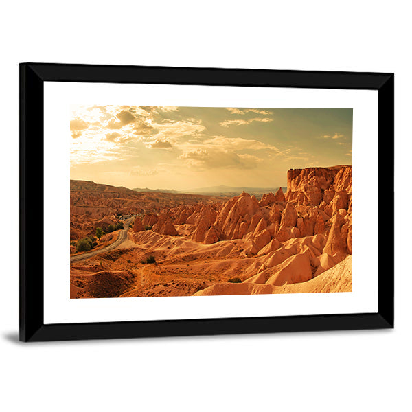 Amazing Stone Formations In Cappadocia Canvas Wall Art in brown, orange and yellow, framed print, product view on a white background