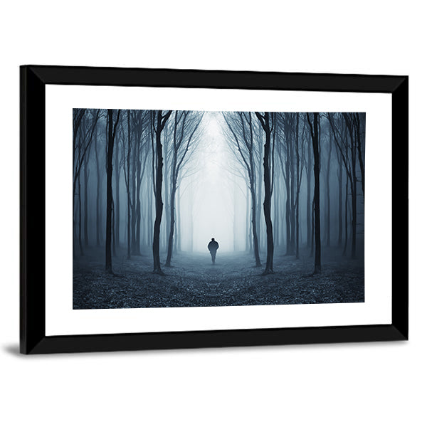Man Walking Through A Fairytale Forest Canvas Wall Art in black, white and blue, framed print, product view on a white background