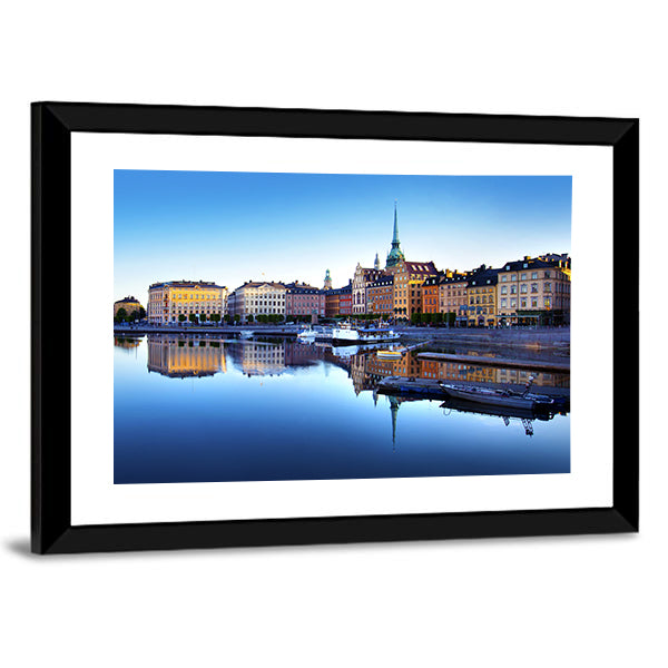 Old Town Of Stockholm In Sweden Canvas Wall Art in orange, yellow and blue, framed print, product view on a white background