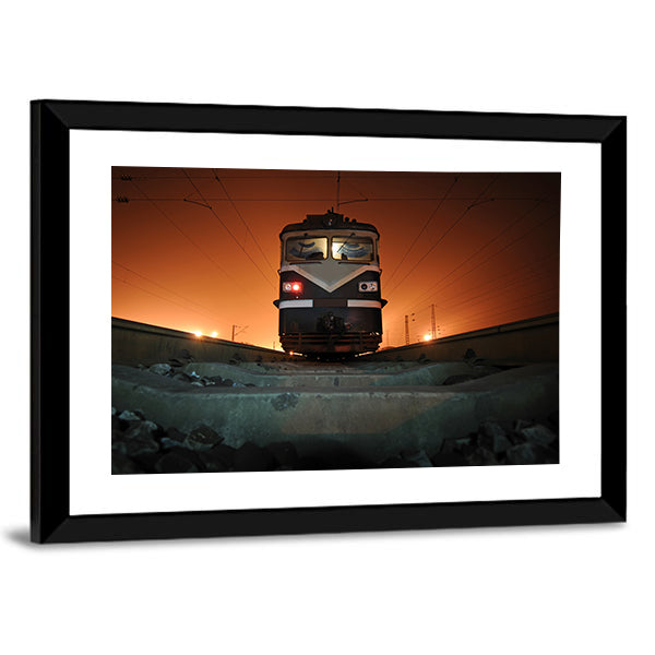 Chinese Electric Train at Night Canvas Wall Art in black, gray and orange, framed print, product view on a white background