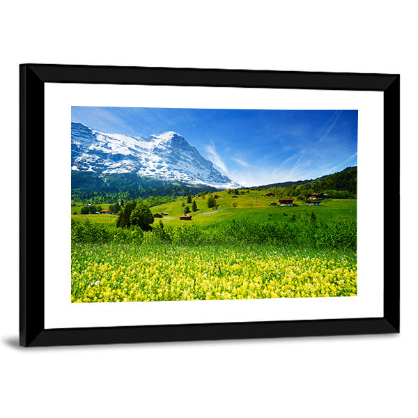 Swiss Alpine Wildflower Meadow Canvas Wall Art in yellow, green and blue, framed print, product view on a white background