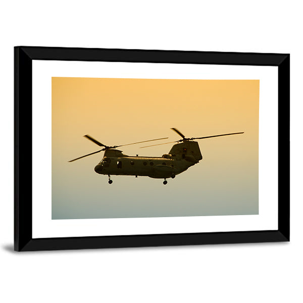 Military Cargo Helicopter In Flight At Dawn Canvas Wall Art