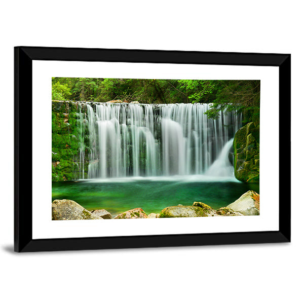 Lake Emerald Waterfalls Canvas Wall Art in white and green, framed print, product view on a white background