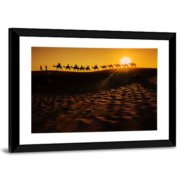 Camel Caravan at Sunset Canvas Wall Art in black, orange and yellow, framed print, product view on a white background