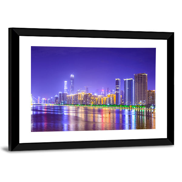 Guangzhou Skyline Over Pearl River Canvas Wall Art in gold, blue and purple, framed print, product view on a white background