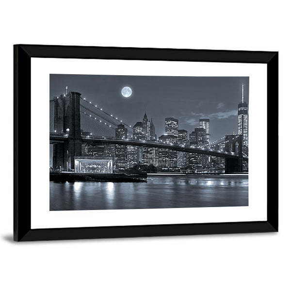 Brooklyn Bridge and Lower Manhattan by Moonlight Canvas Wall Art in black, white and gray, framed print, product view on a white background