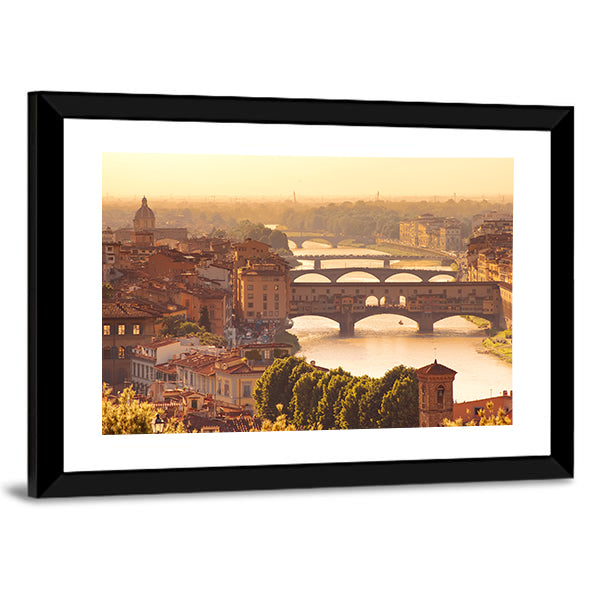 View To Bridge Ponte Vecchio In Florence Italy Canvas Wall Art in brown, orange and yellow, framed print, product view on a white background