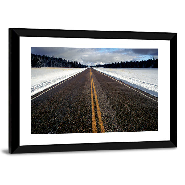 Straight Strip Of Road In Winter Canvas Wall Art