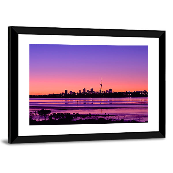 Auckland City Sunrise Canvas Wall Art in orange, purple and pink, framed print, product view on a white background