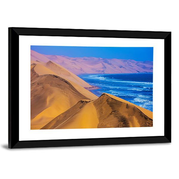 Namibia Sand Dunes Along the Atlantic Coast Canvas Wall Art in beige, orange and blue, framed print, product view on a white background
