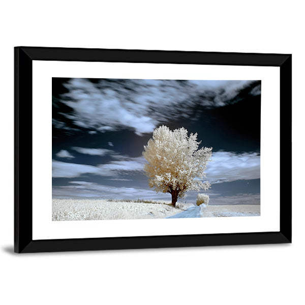 Alone Tree In Winter Canvas Wall Art in black, white and blue, framed print, product view on a white background