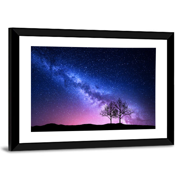 Starry Sky With Pink Milky Way Canvas Wall Art in blue, purple and pink, framed print, product view on a white background