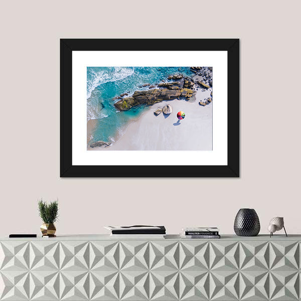 Umbrella On The Beach And Foam Of Sea Wave Canvas Wall Art