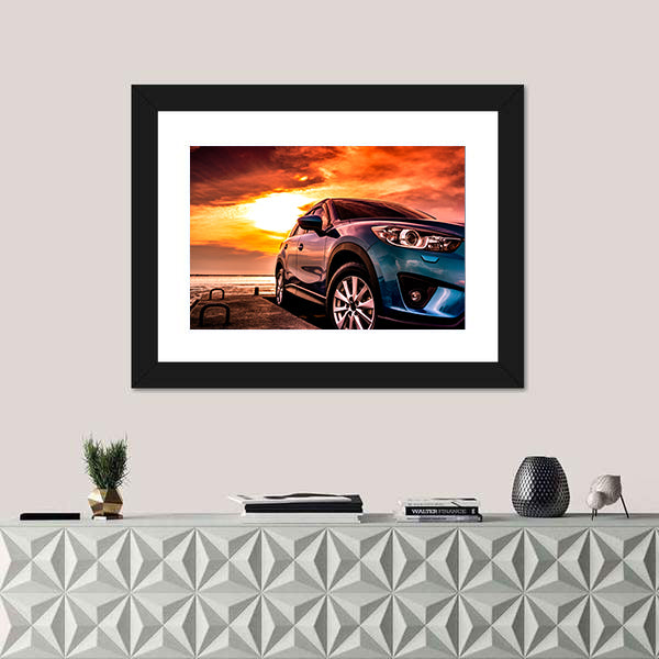 Blue Suv at Coastal Sunset Canvas Wall Art