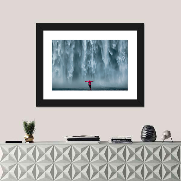 Girl Against Skogafoss Waterfall At South Iceland Canvas Wall Art
